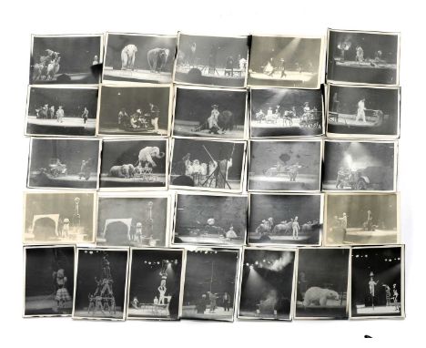 CIRCUS ACTS,mid-20th century, a collection of 61 gelatin silver print photographs, in the snapshot manner of Kurt Hutton, sho
