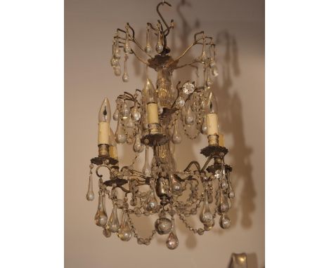 A Continental six-light brass and glass drop chandelier 