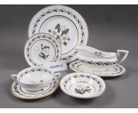 A Royal Worcester bone china "Bernina" pattern part dinner service, including gravy boats, two tureens and three similar plat