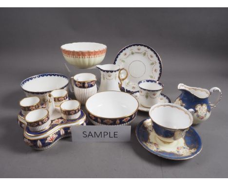 A Minton part dinner service with blue, gilt and floral decoration, a Royal Worcester part teaset and another part teaset 