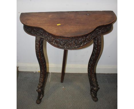 A Kashmir carved walnut shape front console table, on cabriole supports, 28" wide x 15" deep x 31" high 