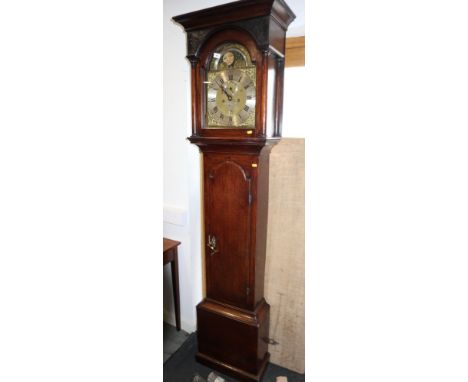 A 19th century oak long case clock with brass and silvered moon-phase dial signed Joshua Moore Cranley, 85" high overall 