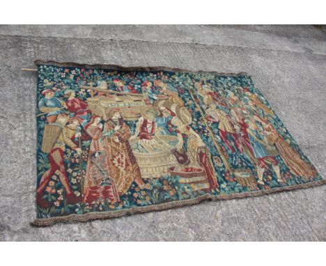 A Jacquard woven tapestry with figures in a landscape design, 73 1/2" wide x 49" high 