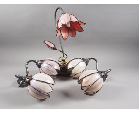 An Art Nouveau style table lamp, formed as a flower, 17 1/2" high, and a pair of similar two-branch wall lights 