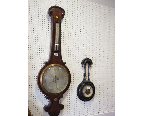A Victorian rosewood barometer and thermometer, and another smaller similar barometer and thermometer, in oak case 