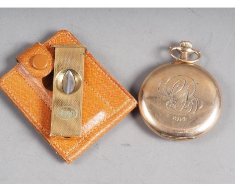 A rolled gold cased Exselsior open faced pocket watch with white enamel dial and Arabic numerals, and a gilt Esso cigar cutte