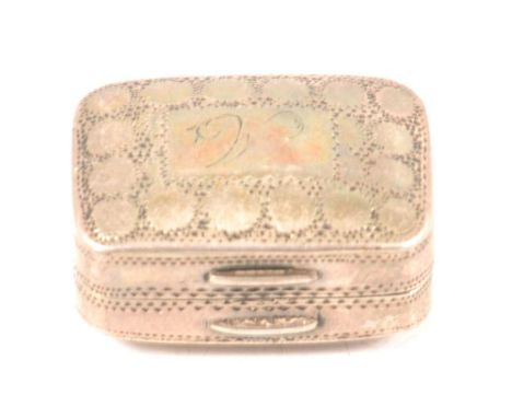 A silver vinaigrette, Samuel Pemberton, Birmingham 1804, circular stud design with initial M in cartouche, gilded interior wi