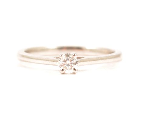 A diamond solitaire ring, the brilliant cut stone claw set in a 9 carat all white gold mount ring size L, approximate weight 