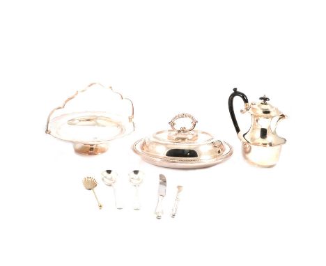 A silver-plated four piece teaset of oval form and cut edge design; bead edge design entree dish with detachable handle; plai