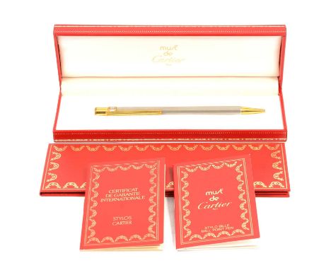 Must de Cartier - a ballpoint pen, silver-coloured brushed finish with gold-coloured highlights, in fitted red leather box, w