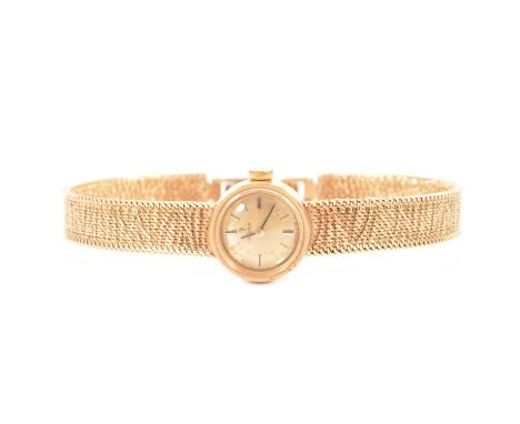 Omega - a lady's 9 carat yellow gold bracelet watch, 13mm circular champagne baton dial in a 15mm 9 carat yellow gold case nu