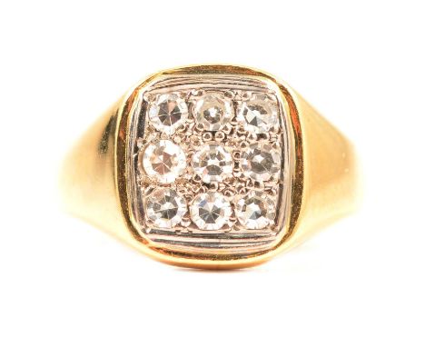 A diamond nine stone ring, the 8 cut stones pave set in an 18 carat yellow and white gold signet ring mount, London 1981, rin