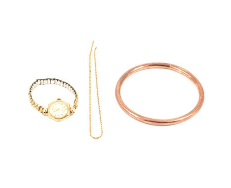 A 9 carat rose gold 6.2mm hollow tubular upper arm bangle, Birmingham 1921, 11.3g; a lady's Cyma 9 carat yellow gold wristwat