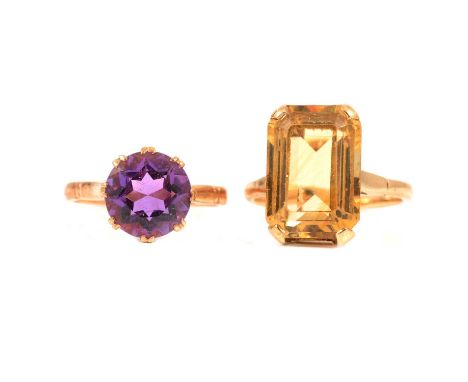 Two gemset dress rings, a rectangular emerald cut citrine, 15.5 x 11mm, four claw set in a yellow metal mount marked 9ct, rin