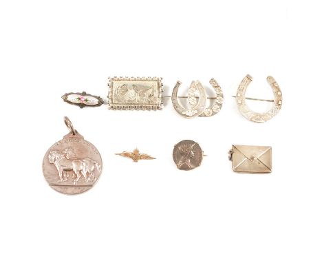 A collection of Victorian and later silver brooches, 35mm horseshoe, Birmingham 1884; 45mm double horseshoe, Birmingham; 40mm