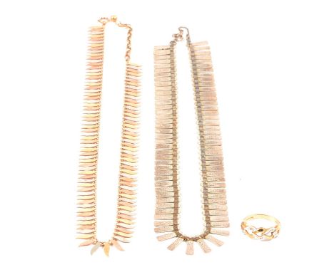 A yellow, rose and white metal fringe necklace, a diamond set ring, and a silver fringe necklace, a yellow, rose and white me