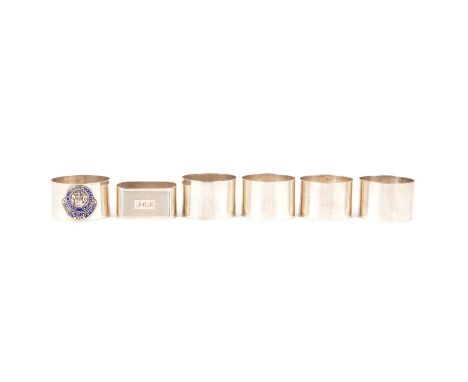 Six silver napkin rings, a set of four plain 30mm flat section napkin rings, Birmingham 1932, not engraved; a single silver 3