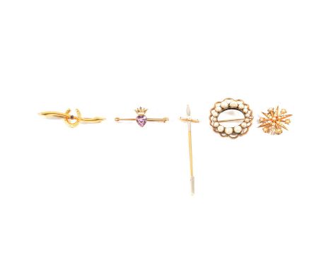 A sword design stick pin, four other brooches, a 75mm sword design stick pin set with four seed pearls, marked 15ct Plat; a 2