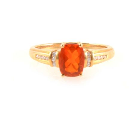 A Mexican fire opal and diamond ring, the rectangular cushion shaped opal 8mm x 5.5mm, four claw set with three brilliant cut