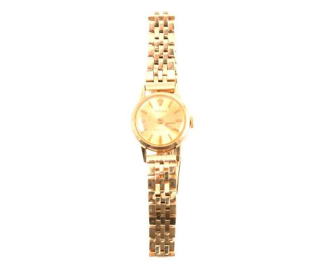 Rolex - a lady's Precision gold wristwatch, 16mm circular champagne baton dial in a 20mm yellow metal case numbered 446347, i