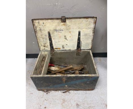 An early 20th century joiner's tool box containing various hand tools 