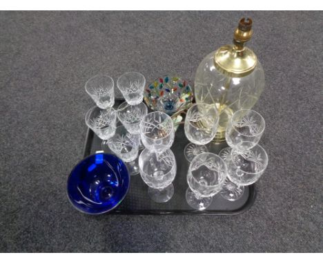 A tray containing assorted glassware to include glass and brass table lamp base, assorted wine glasses, a coloured Venetian g