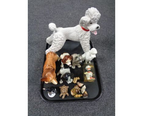 A tray containing assorted animal ornaments to include Wade Whimsies, Walt Disney, Minnie Mouse, Sylvac dogs etc. 