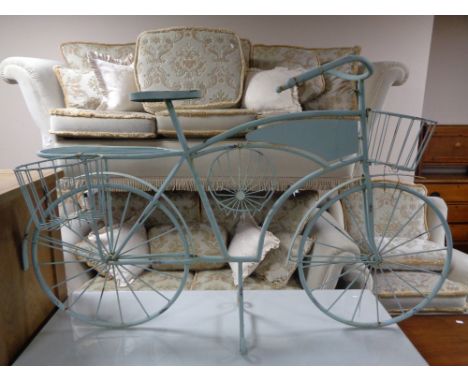A metal bicycle planter. 