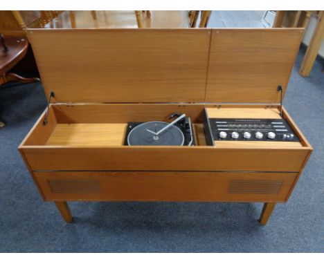 A teak cased stereo sound music system with Garrard turntable in teak cabinet 