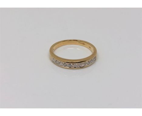 A 9ct gold diamond set half eternity ring, size J CONDITION REPORT: 1.8g