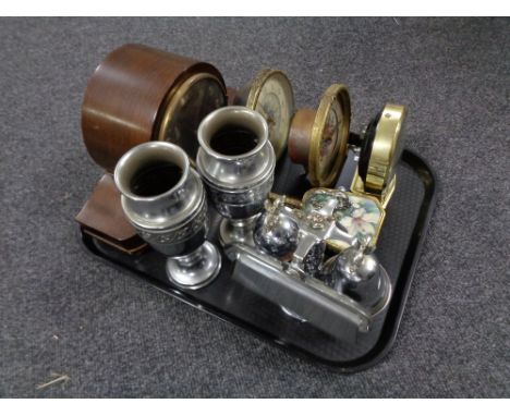 A tray containing Art Deco mantel clock, a pair of metal embossed vases, miniature companion set on stand, petit point dressi