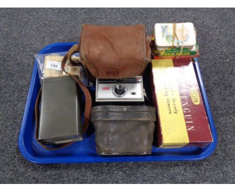 A quantity of antique Kensitas cigarette silks, pair of field binoculars, Brownie camera, old Rowntree's cocoa tin etc.