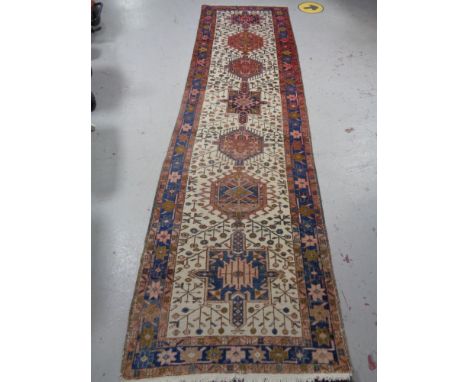A Karabagh runner, South Caucasus, 348cm by 94cm 
