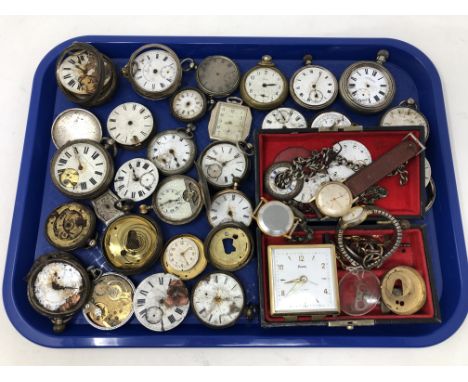 A large collection of antique and later pocket watches, examples in silver, white metal, wrist watches, travelling clock, poc