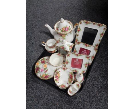 A tray of fourteen pieces of Royal Albert Old Country Roses china to include mantel clock, picture frames etc 