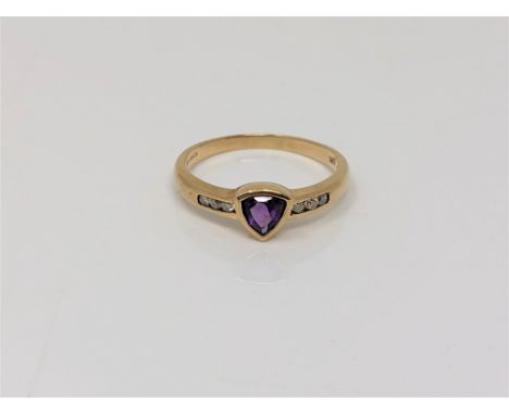 A 9ct gold amethyst and diamond ring, size P CONDITION REPORT: 1.9g