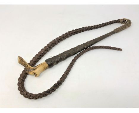 A 19th century antler-handled riding whip