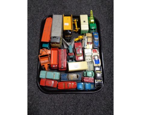 A tray of mid 20th century and later play worn die cast vehicles including Lesney, Farnborough, car transporter, Dinky fire e