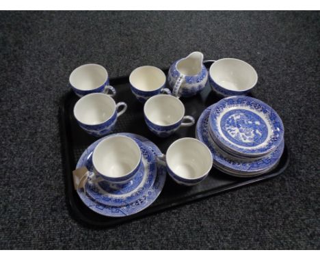 A tray of twenty piece Staffordshire willow pattern tea service 