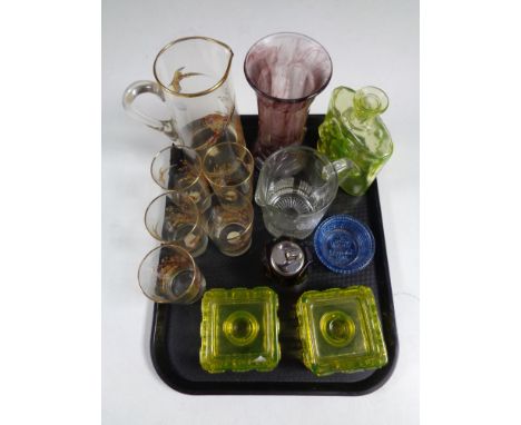 A tray containing 20th century glassware to include coronation jug, jug and beakers depicting pheasants in flight, a Finnish 