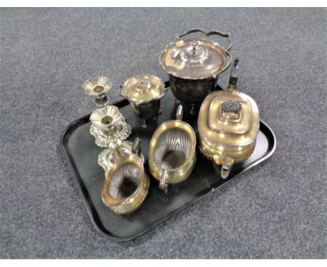 A tray of plated wares, pair of candlesticks, three piece tea service and two graduated lidded pots 