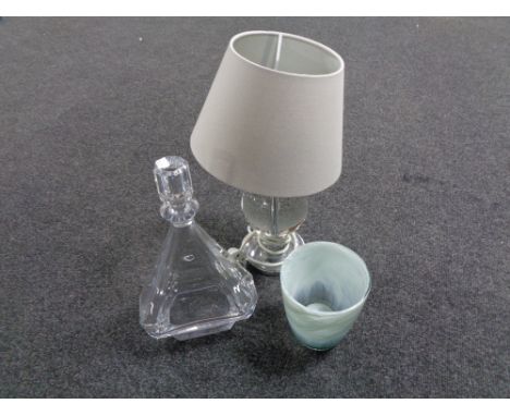 A Ragaska crystal liqueur decanter together with a further glass vase and a contemporary table lamp with shade. 