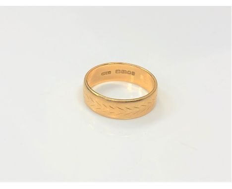 An 18ct gold band ring, size J CONDITION REPORT: 3.2g