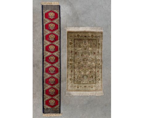 Two Oriental hand-made carpets. Silk and Wool.&nbsp;Silk carpet is signed at the top.&nbsp;Dimensions for the silk carpet.&nb