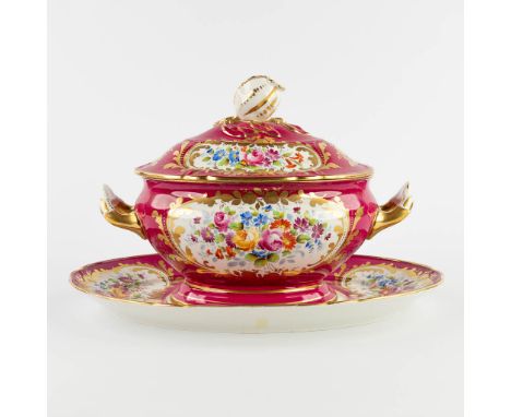 A polychrome porcelain tureen with a lid on a stand, hand-painted flower decors, pomegranate finial.Marked with a Sèvres porc