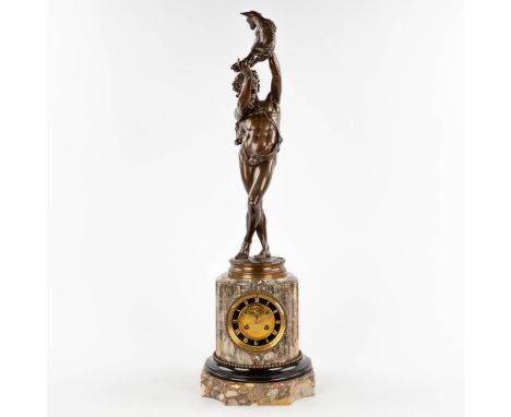 Charles Alphonse A. GUMERY (1827-1871) 'Mantle clock with a Faun, holding a lamb'.&nbsp;Patinated&nbsp;bronze figurine marked