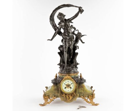 Auguste MOREAU (1834-1917) A mantle clock, spelter on green onyxStatue signed 'Le Char De Jeunesse'19th century.&nbsp;Dimensi