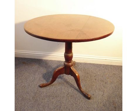 A George III period circular tilt-top mahogany tripod occasional table (80cm diameter)