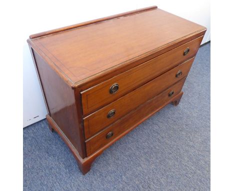 An early 20th century oak chest; the&nbsp;galleried&nbsp;top above three full-width drawers, raised on bracket feet (92cm wid