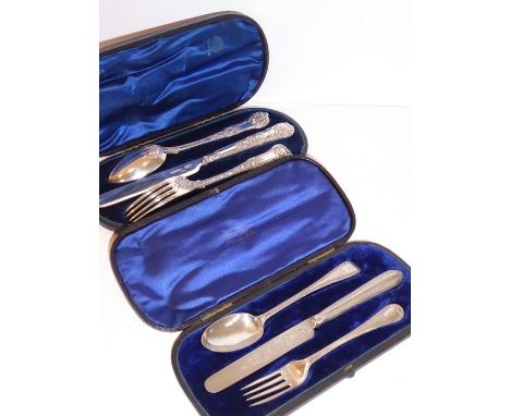 Two 19th century&nbsp;cased hallmarked silver knife, fork and spoon sets; each engraved with monograms and one in double stru